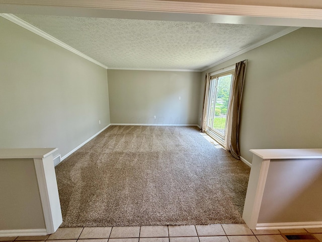 1724 Ramblewood Ave, Columbus, OH 43235 - empty room with light colored carpet, crown molding, a textured ceiling, and light tile patterned floors
