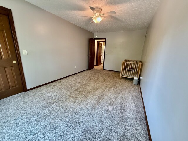 1724 Ramblewood Ave, Columbus, OH 43235 - spare room with carpet, a textured ceiling, and ceiling fan