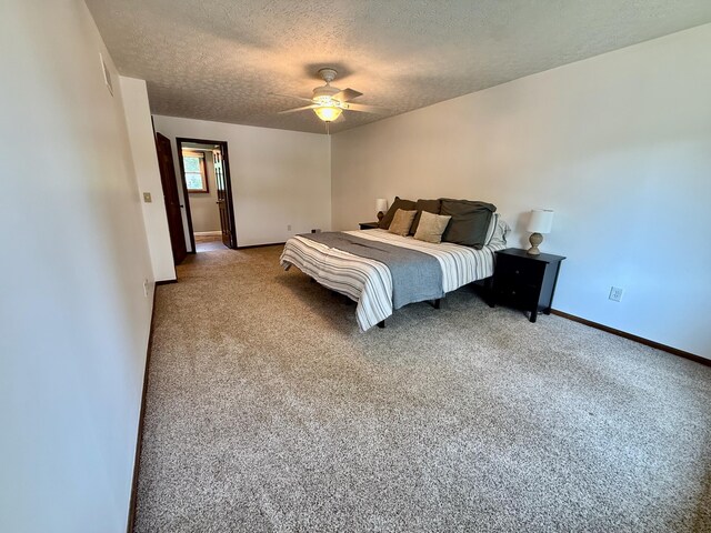 1724 Ramblewood Ave, Columbus, OH 43235 - bedroom featuring light colored carpet, a textured ceiling, and ceiling fan