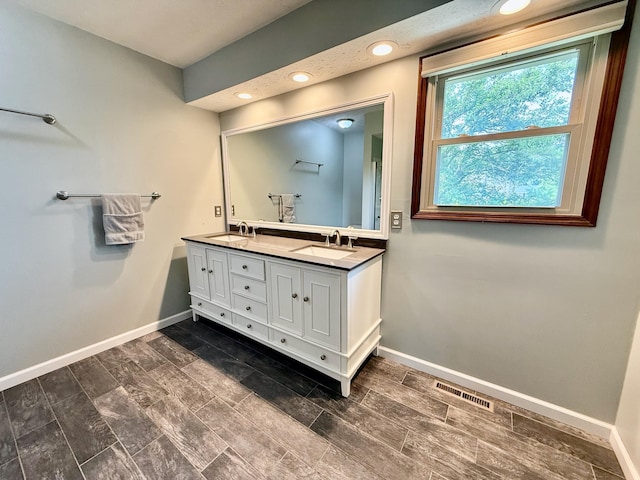 1724 Ramblewood Ave, Columbus, OH 43235 - full bathroom with double vanity and recessed lighting