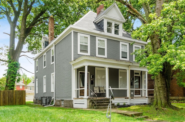 730-732 Oakwood Ave, Columbus, OH 43205 - traditional style home with a chimney and covered porch
