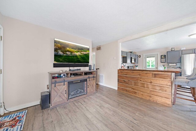 136 Ridgeview Ct, Johnstown, OH 43031 - living room with light wood-style floors