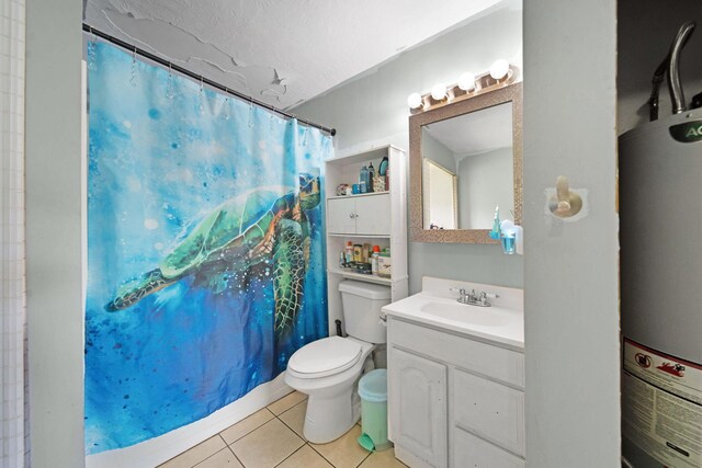 136 Ridgeview Ct, Johnstown, OH 43031 - full bath with water heater, tile patterned floors, vanity, a shower with curtain, and a textured ceiling