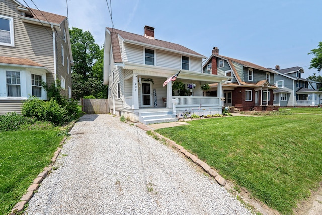 297 Central Ave, Newark, OH 43055 - view of front of home with gravel driveway, covered porch, and a chimney