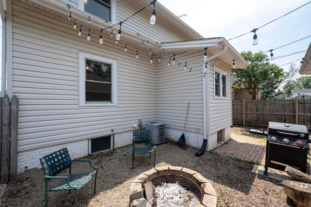 297 Central Ave, Newark, OH 43055 - rear view of house featuring an outdoor fire pit and a patio area