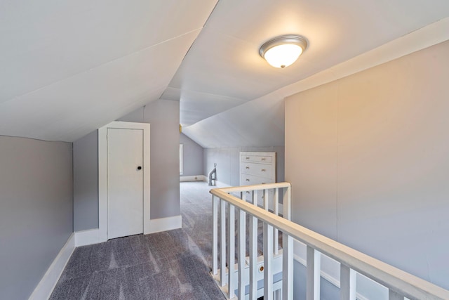 297 Central Ave, Newark, OH 43055 - hallway featuring carpet floors, lofted ceiling, and an upstairs landing