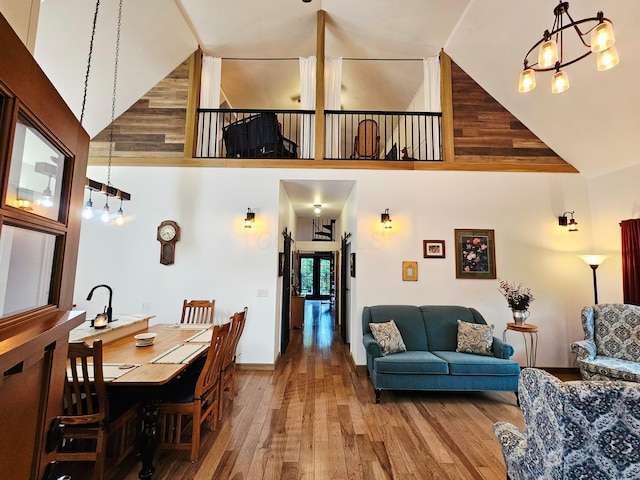 1240 Beath Ln, South Salem, OH 45681 - living room with high vaulted ceiling, hardwood / wood-style floors, and a chandelier