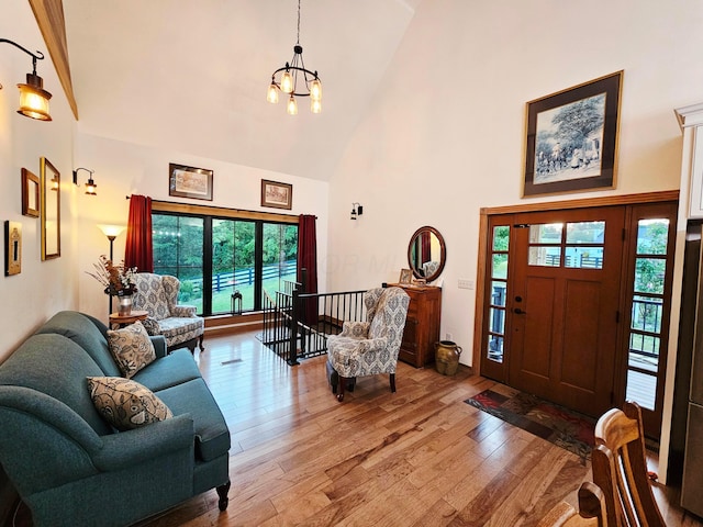 1240 Beath Ln, South Salem, OH 45681 - entrance foyer with high vaulted ceiling, a chandelier, and light wood-type flooring