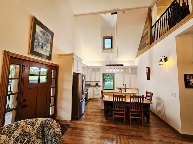 1240 Beath Ln, South Salem, OH 45681 - dining room with dark wood-type flooring and a towering ceiling