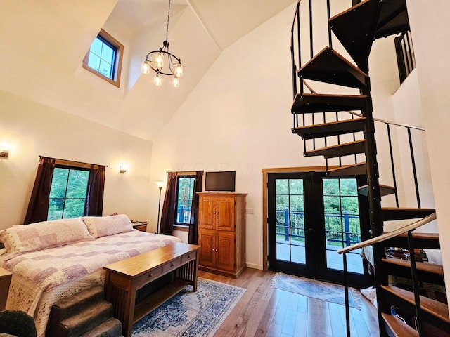 1240 Beath Ln, South Salem, OH 45681 - bedroom featuring high vaulted ceiling, french doors, a chandelier, access to outside, and multiple windows