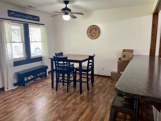 10363 Bremen Rd, Logan, OH 43138 - dining space with ceiling fan and dark wood finished floors