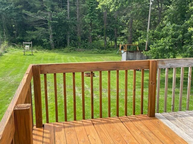 10363 Bremen Rd, Logan, OH 43138 - wooden deck featuring a lawn and a playground