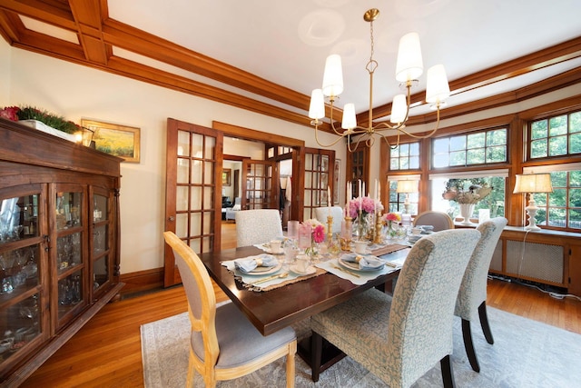 2465 E Broad St, Bexley, OH 43209 - dining room with a chandelier, radiator heating unit, wood finished floors, coffered ceiling, and beamed ceiling