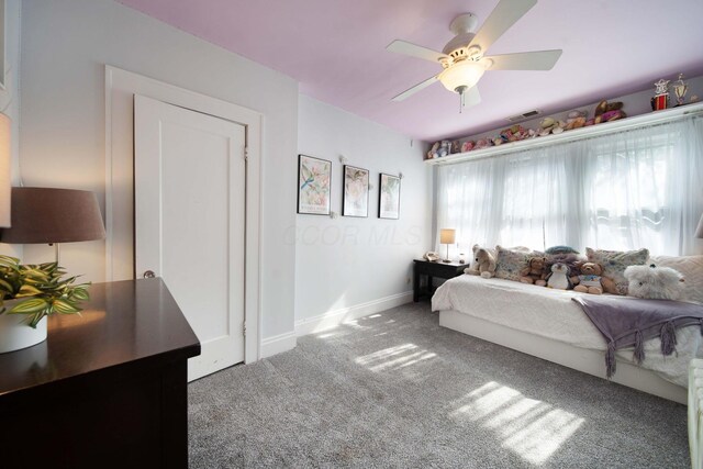 2465 E Broad St, Bexley, OH 43209 - carpeted bedroom featuring baseboards and ceiling fan