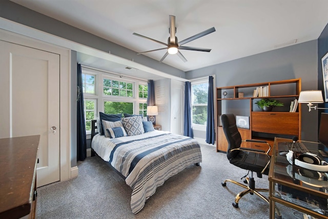 2465 E Broad St, Bexley, OH 43209 - carpeted bedroom featuring multiple windows, an office area, and ceiling fan