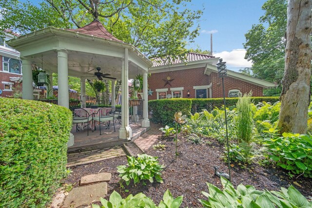 2465 E Broad St, Bexley, OH 43209 - view of yard featuring a ceiling fan and a patio