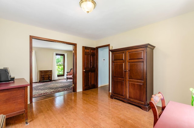 1133 Rockport Ln, Columbus, OH 43235 - office space featuring light wood-style flooring and a baseboard radiator