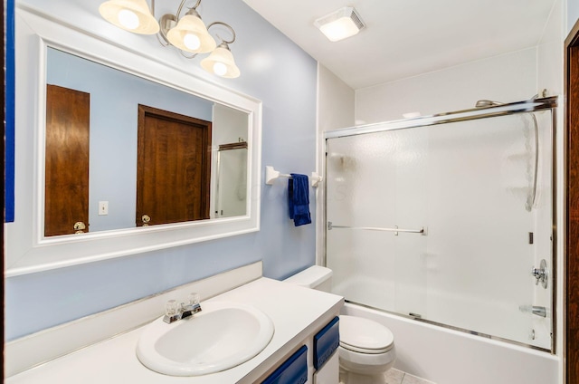1133 Rockport Ln, Columbus, OH 43235 - bathroom featuring vanity and bath / shower combo with glass door