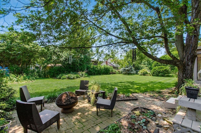 1133 Rockport Ln, Columbus, OH 43235 - view of patio / terrace with an outdoor fire pit