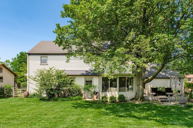 1133 Rockport Ln, Columbus, OH 43235 - rear view of house featuring a sunroom, a wooden deck, and a shingled roof