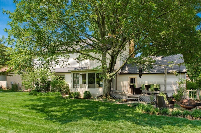 1133 Rockport Ln, Columbus, OH 43235 - back of house featuring a deck, roof with shingles, and a sunroom