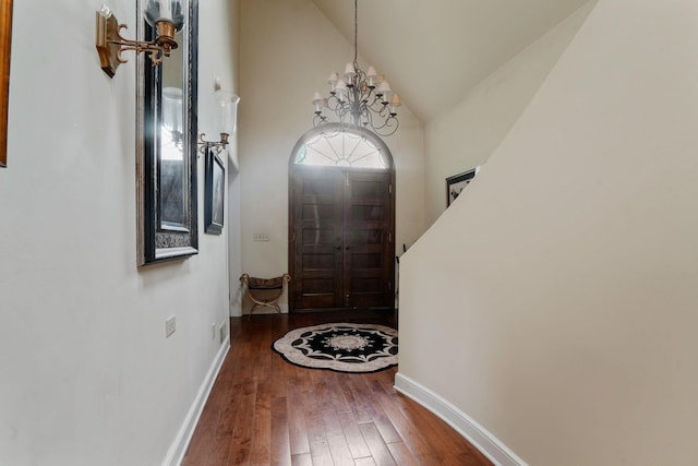161 Jackson St, Columbus, OH 43206 - entryway with hardwood / wood-style floors, a chandelier, and high vaulted ceiling