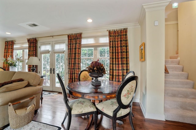161 Jackson St, Columbus, OH 43206 - dining space featuring hardwood / wood-style floors, french doors, stairs, ornamental molding, and recessed lighting