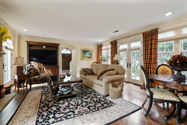 161 Jackson St, Columbus, OH 43206 - living area featuring french doors, healthy amount of natural light, crown molding, wood-type flooring, and recessed lighting