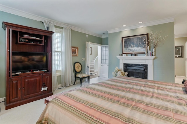 161 Jackson St, Columbus, OH 43206 - carpeted bedroom featuring a premium fireplace, crown molding, and recessed lighting