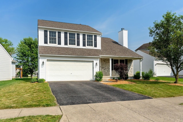 113 Olentangy Meadows Dr, Lewis Center, OH 43035 - traditional-style house with asphalt driveway, a front lawn, a chimney, a shingled roof, and an attached garage