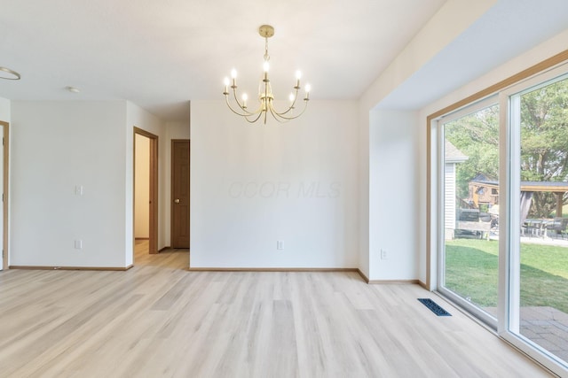 113 Olentangy Meadows Dr, Lewis Center, OH 43035 - unfurnished dining area with light wood-type flooring and a chandelier