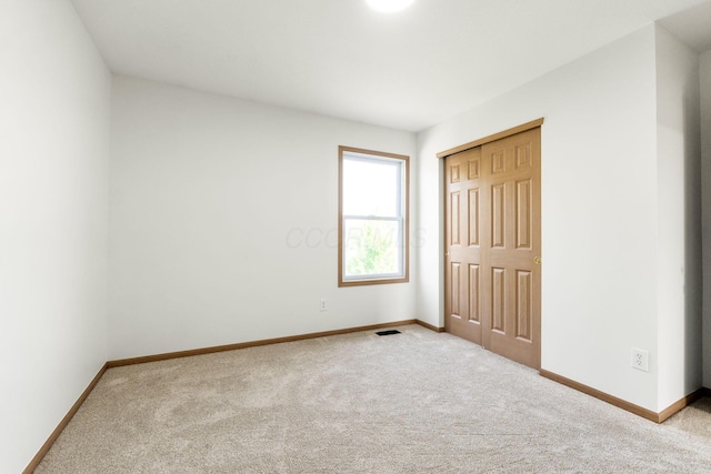 113 Olentangy Meadows Dr, Lewis Center, OH 43035 - unfurnished bedroom featuring carpet flooring and a closet