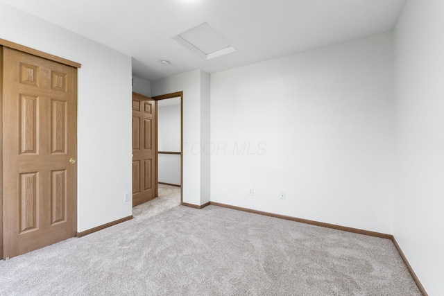 113 Olentangy Meadows Dr, Lewis Center, OH 43035 - unfurnished bedroom featuring carpet floors and attic access