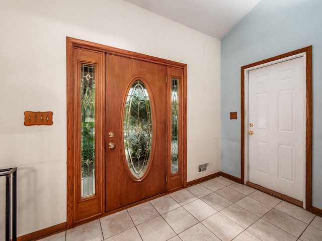 1530 Pemberton Dr, Columbus, OH 43221 - foyer with light tile patterned floors and lofted ceiling