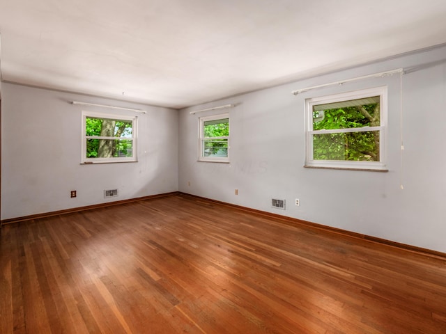 1530 Pemberton Dr, Columbus, OH 43221 - unfurnished room featuring hardwood / wood-style floors and baseboards