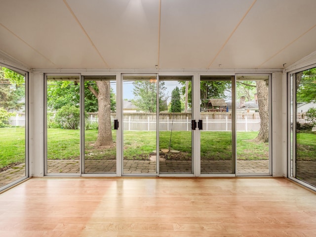 1530 Pemberton Dr, Columbus, OH 43221 - unfurnished sunroom featuring floor to ceiling windows, wood finished floors, and a water view