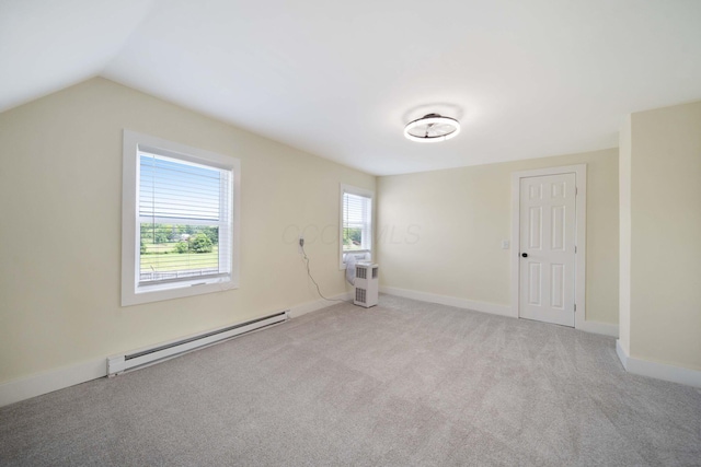 11 E Main St, Sparta, OH 43350 - additional living space featuring a baseboard radiator, carpet floors, and vaulted ceiling
