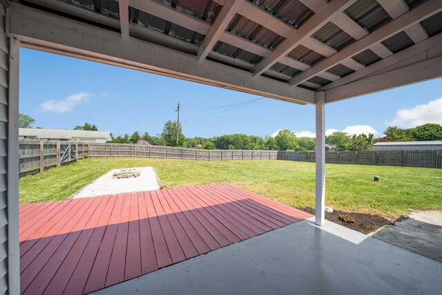 11 E Main St, Sparta, OH 43350 - wooden deck featuring a fenced backyard and a patio