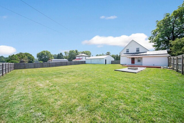 11 E Main St, Sparta, OH 43350 - fenced backyard featuring a wooden deck