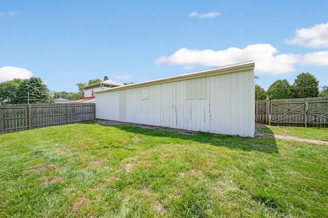 11 E Main St, Sparta, OH 43350 - view of outdoor structure with a fenced backyard