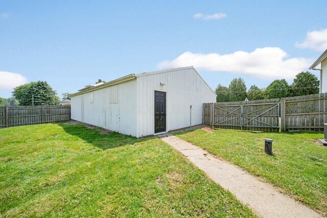 11 E Main St, Sparta, OH 43350 - view of outdoor structure with a fenced backyard