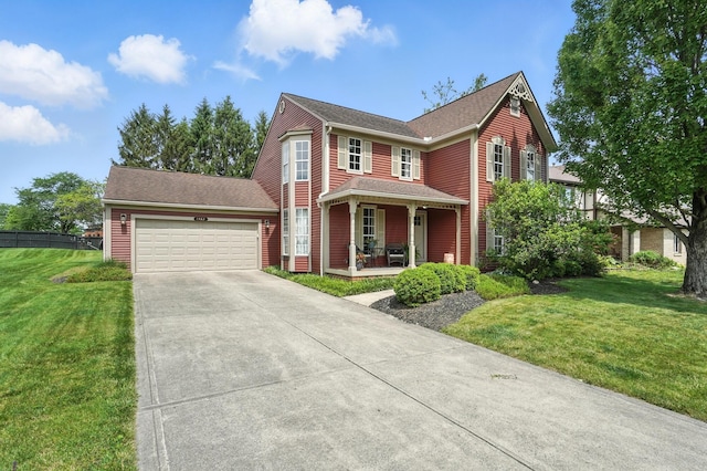 1482 Buckpoint Ln, Worthington, OH 43085 - victorian house featuring a porch, an attached garage, and concrete driveway