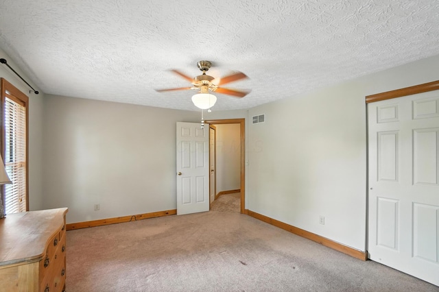 1482 Buckpoint Ln, Worthington, OH 43085 - unfurnished bedroom with light carpet, a ceiling fan, and a textured ceiling
