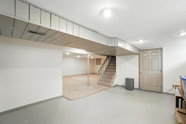 1482 Buckpoint Ln, Worthington, OH 43085 - finished below grade area featuring stairway and a textured ceiling