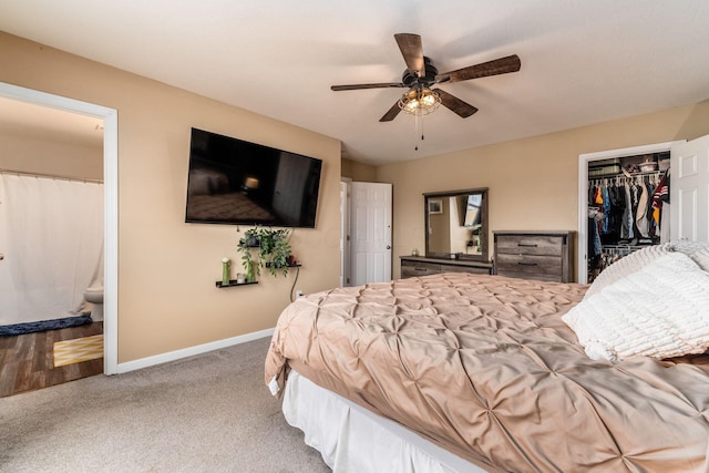 5070 River Bend Dr, South Bloomfield, OH 43103 - bedroom with carpet flooring, a closet, ensuite bath, a ceiling fan, and a walk in closet