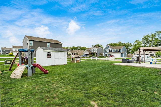 5070 River Bend Dr, South Bloomfield, OH 43103 - view of yard featuring a playground, a residential view, and a storage shed