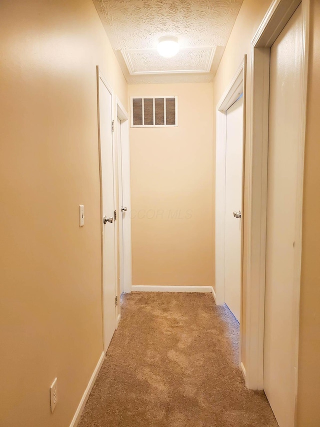 6149 Georges Park Dr Unit 9E, Canal Winchester, OH 43110 - hall featuring carpet flooring and a textured ceiling