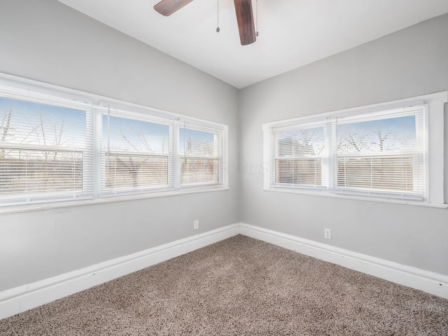 126 E 6th Ave Unit 126, Columbus, OH 43201 - carpeted empty room featuring a ceiling fan and baseboards