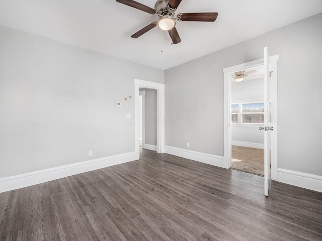 126 E 6th Ave Unit 126, Columbus, OH 43201 - unfurnished bedroom with dark wood-type flooring and ceiling fan