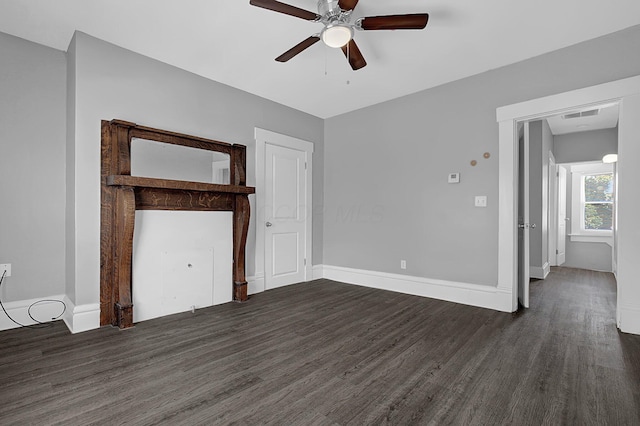126 E 6th Ave Unit 126, Columbus, OH 43201 - unfurnished living room featuring dark wood-style flooring and ceiling fan